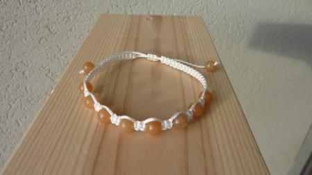 10 € -Calcite orange 6mm - fil écru